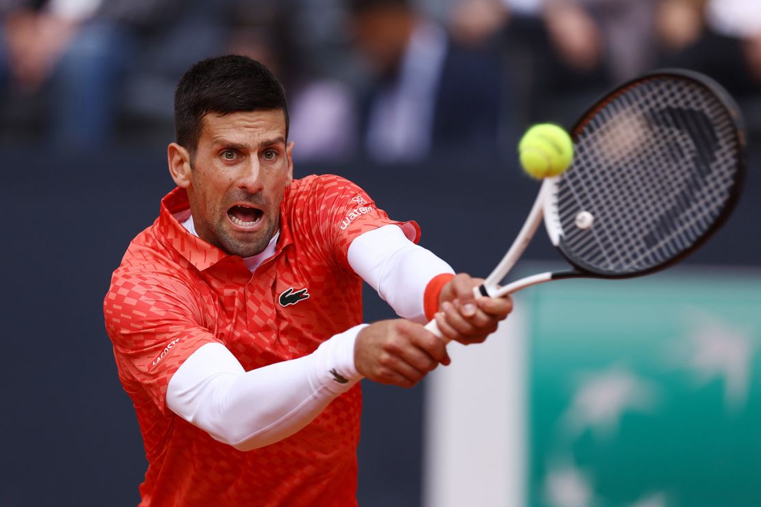 Djokovic plays a backhand against Holger Roon at the Italian Open. 