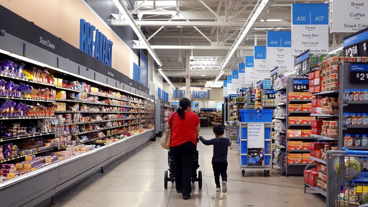 CHICAGO, ILLINOIS - MAY 18: Customers shop at a Walmart store on May 18, 2023 in Chicago, Illinois. Walmart, the world's largest retailer, today reported first-quarter same-store sales growth that beat expectations and the company raised its full-year forecast.   (Photo by Scott Olson/Getty Images)