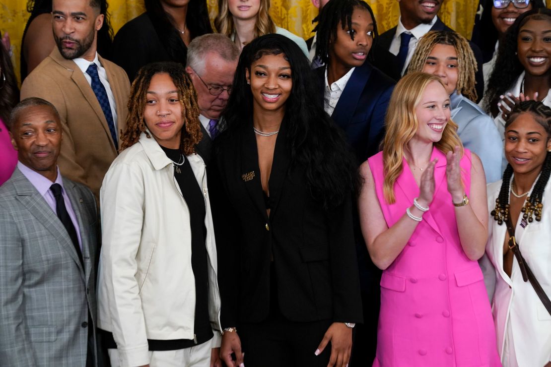 Angel Reese, center, stands with fellow LSU women's basketball team members during an event to honor the 2023 NCAA national champion LSU women's basketball team in the East Room of the White House, Friday, May 26, 2023, in Washington, DC. 