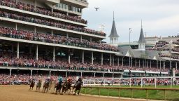 LOUISVILLE, KENTUCKY - MAY 06: The field heads into the first turn during the 149th running of the Kentucky Derby at Churchill Downs on May 06, 2023 in Louisville, Kentucky. (Photo by Michael Reaves/Getty Images)