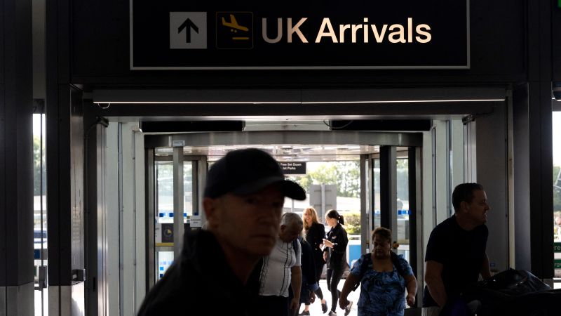 NextImg:Chaos at UK airports as nationwide border system fails | CNN