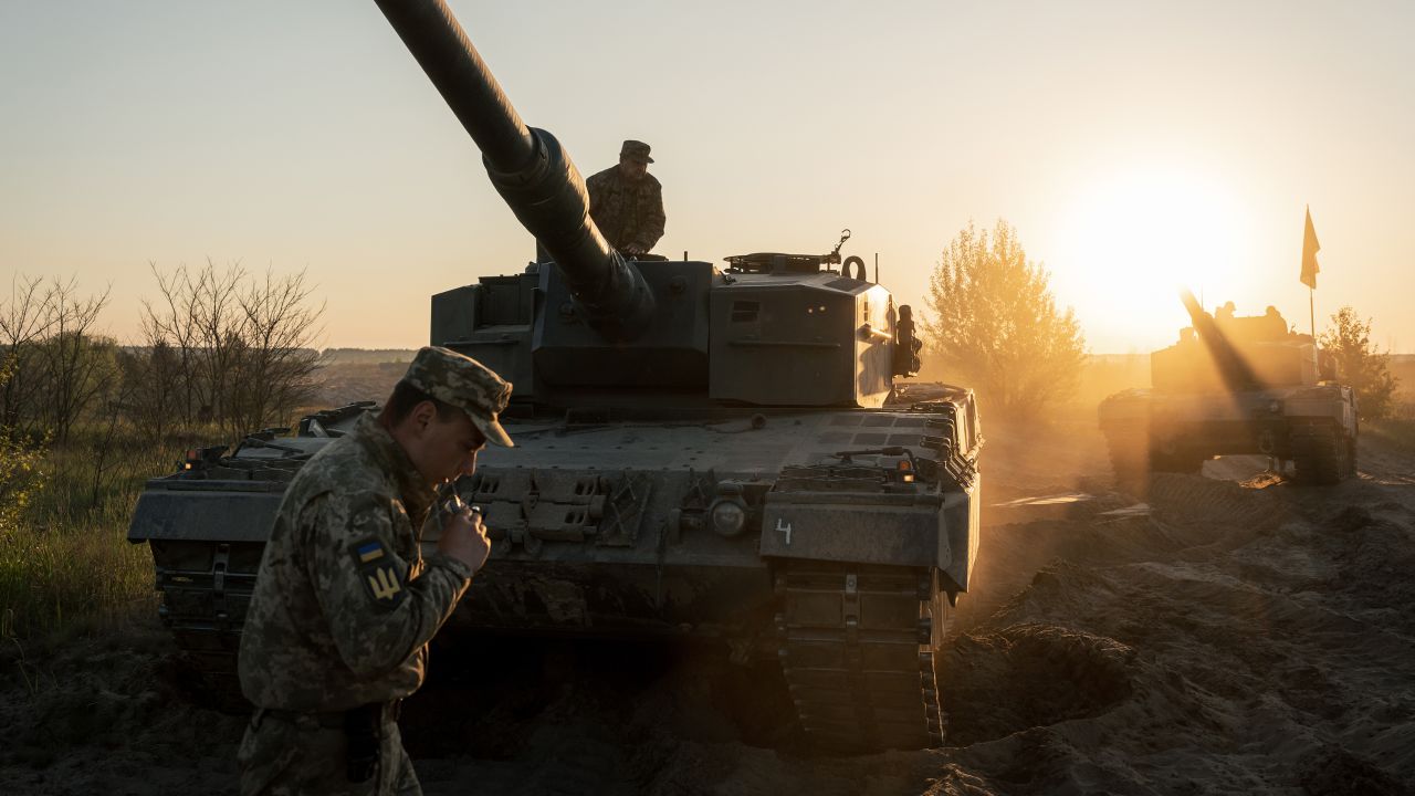 Ukrainian troops are seen training on German Leopard 2 tanks on May 14 in Ukraine.