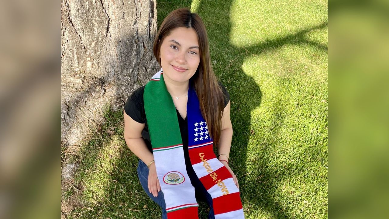 In this undated photo, Naomi Peña Villasano poses with a sash of both the Mexican and American flags that her school district barred her from wearing for her high school graduation ceremony. After Peña Villasano sued the district alleging that it violated her right to free speech, a federal judge in Colorado is weighing whether to let Peña Villasano wear the sash for graduation Saturday, May 27, 2023.