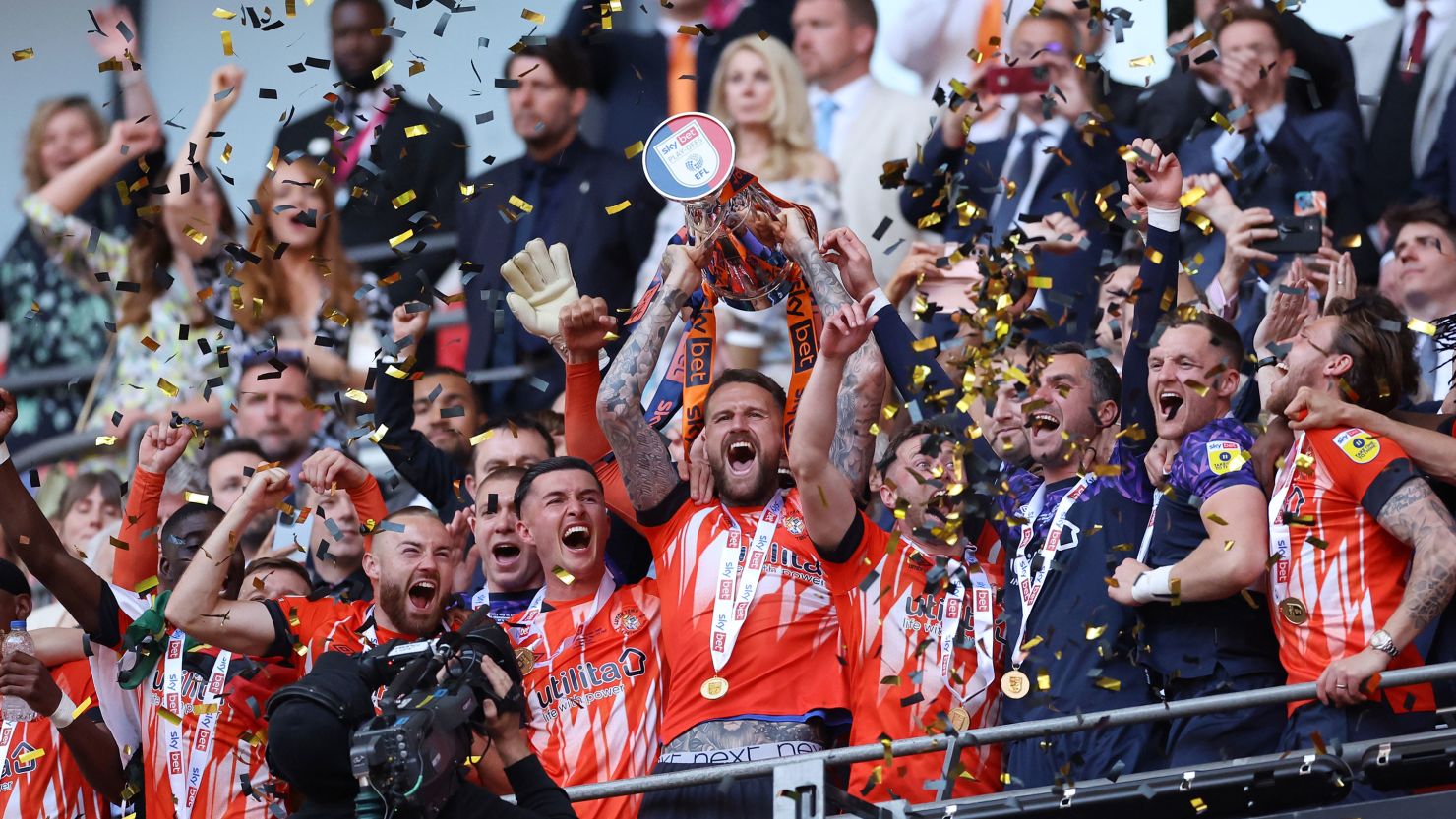 Luton Town players celebrate after the club returned to English football's top flight for the first time in 31 years.