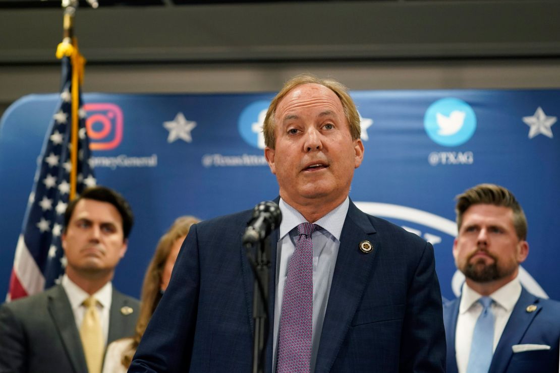 Texas Attorney General Ken Paxton reads a statement at his office in Austin, Texas, Friday, May 26, 2023.