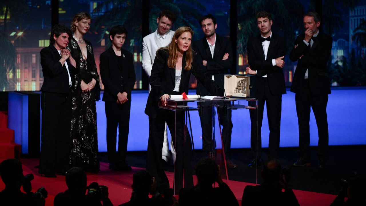French film director Justine Triet delivers a speech on stage after she won the Palme d'Or for the film "Anatomie d'une Chute" (Anatomy of a Fall) during the closing ceremony of the 76th edition of the Cannes Film Festival in Cannes, southern France, on May 27, 2023.
