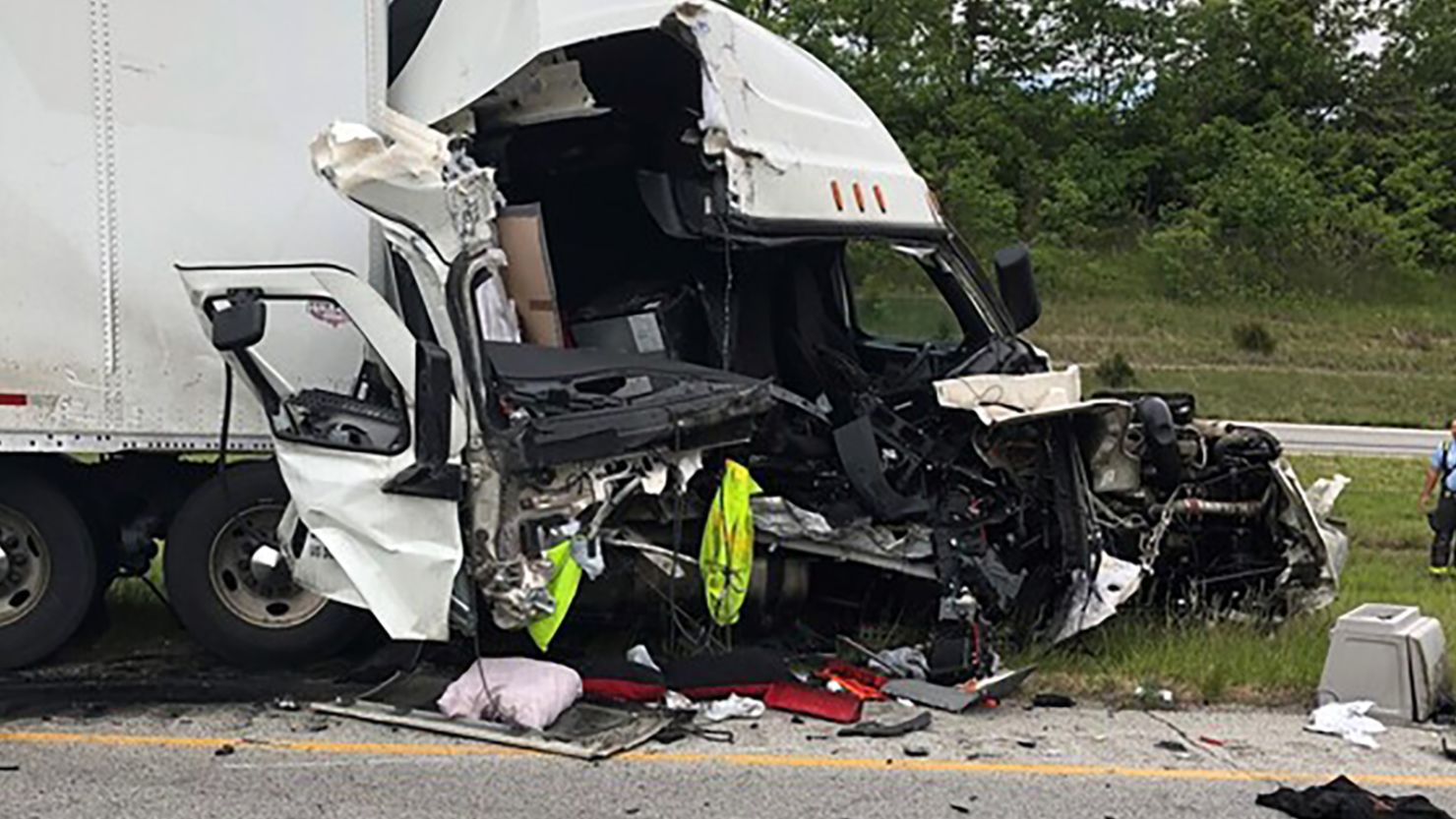 One person is dead, and two others were hospitalized after a crash involving three semi-tractor trailers and four cars on I-70 near Indianapolis Saturday afternoon, according to Indiana State Police.