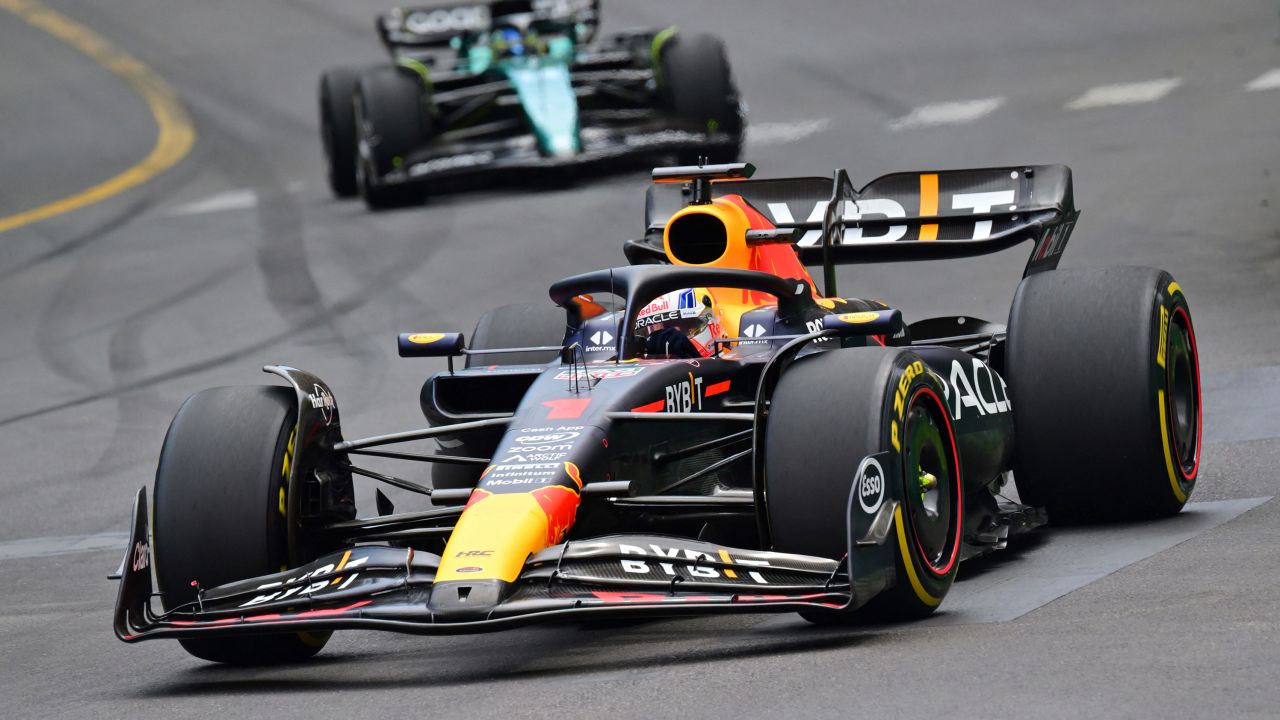 Red Bull Racing's Dutch driver Max Verstappen (front) and Aston Martin's Spanish driver Fernando Alonso compete during the Formula One Monaco Grand Prix at the Monaco street circuit in Monaco, on May 28, 2023. 