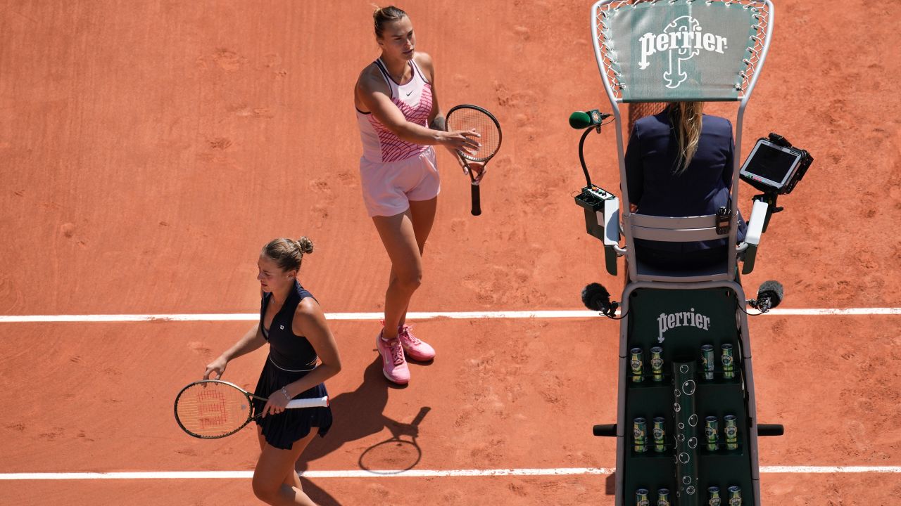 Aryna Sabalenka of Belarus, top, and Ukraine's Marta Kostyuk, left, refused to shake hands at the end of their first round match of the French Open tennis tournament at the Roland Garros stadium in Paris, Sunday, May 28, 2023. Sabalenka won in two sets, 6-3, 6-2. 