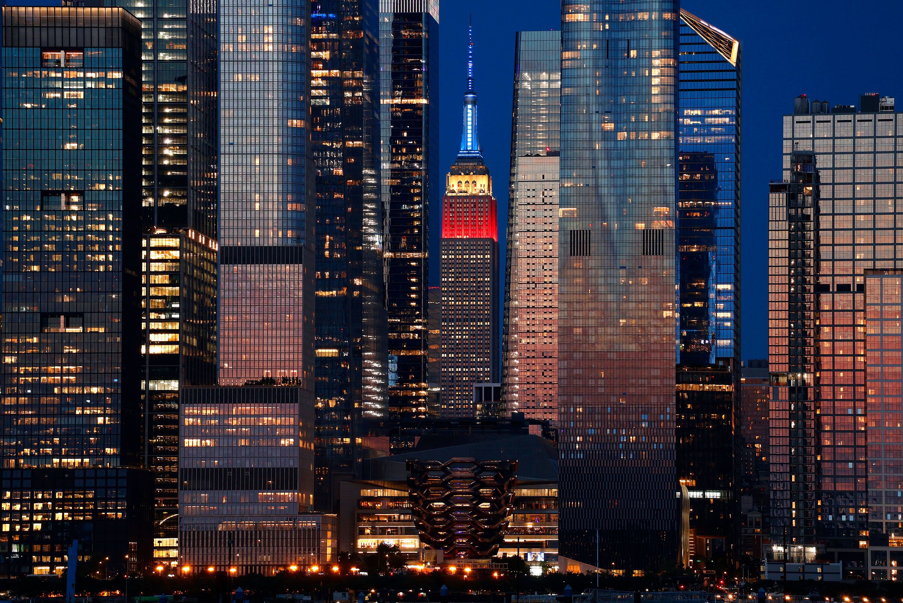 The Empire State Building is lit up in red, white and blue on Saturday.