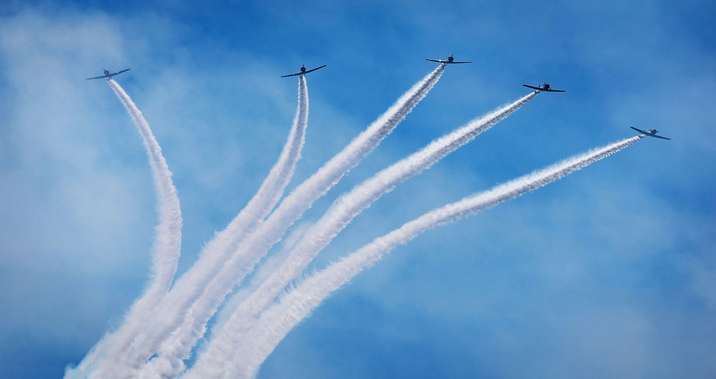 The GEICO Skytypers team performs during an air show in Wantagh, New York, on Saturday.