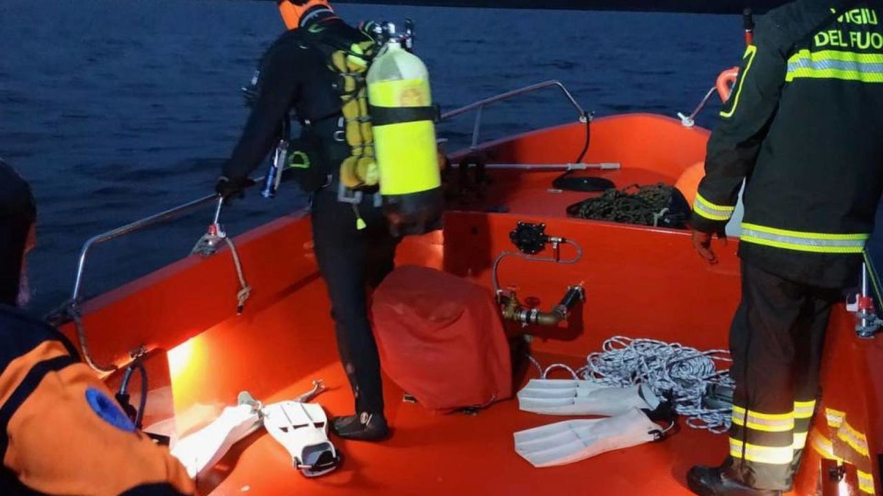 A diver searches for bodies after  a rescue operation in Lake Maggiore, northern Italy.