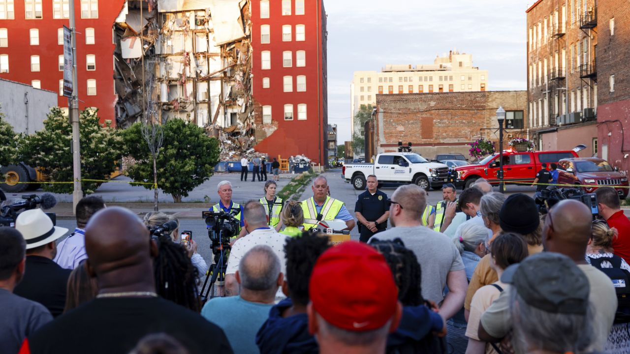 Officials give an update after a partial building collapse Sunday.