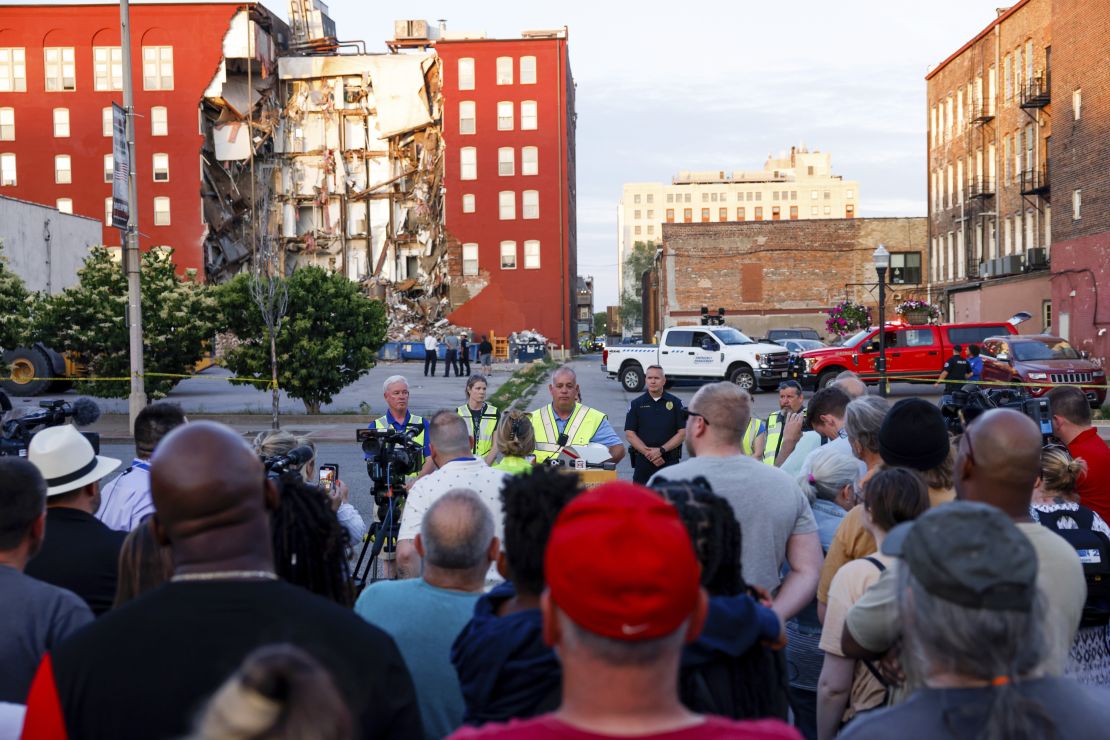 Officials give an update after a partial building collapse Sunday.