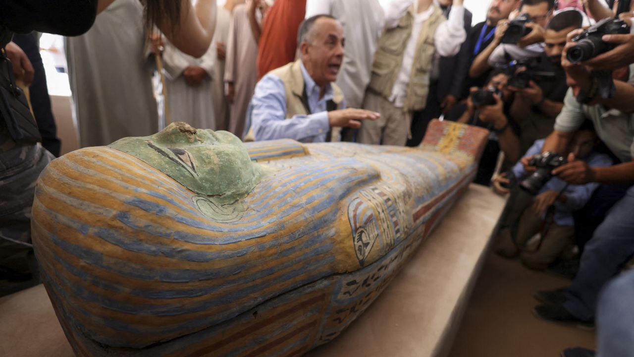 Mostafa Waziri, secretary-general of Egypt's Supreme Council of Antiquities talks to the media next to a sarcophagus found at the newly discovered site where two embalming workshops for humans and animals along with two tombs and a collection of artefacts were also found, near Egypt's Saqqara necropolis, in Giza, Egypt May 27, 2023. REUTERS/Amr Abdallah Dalsh