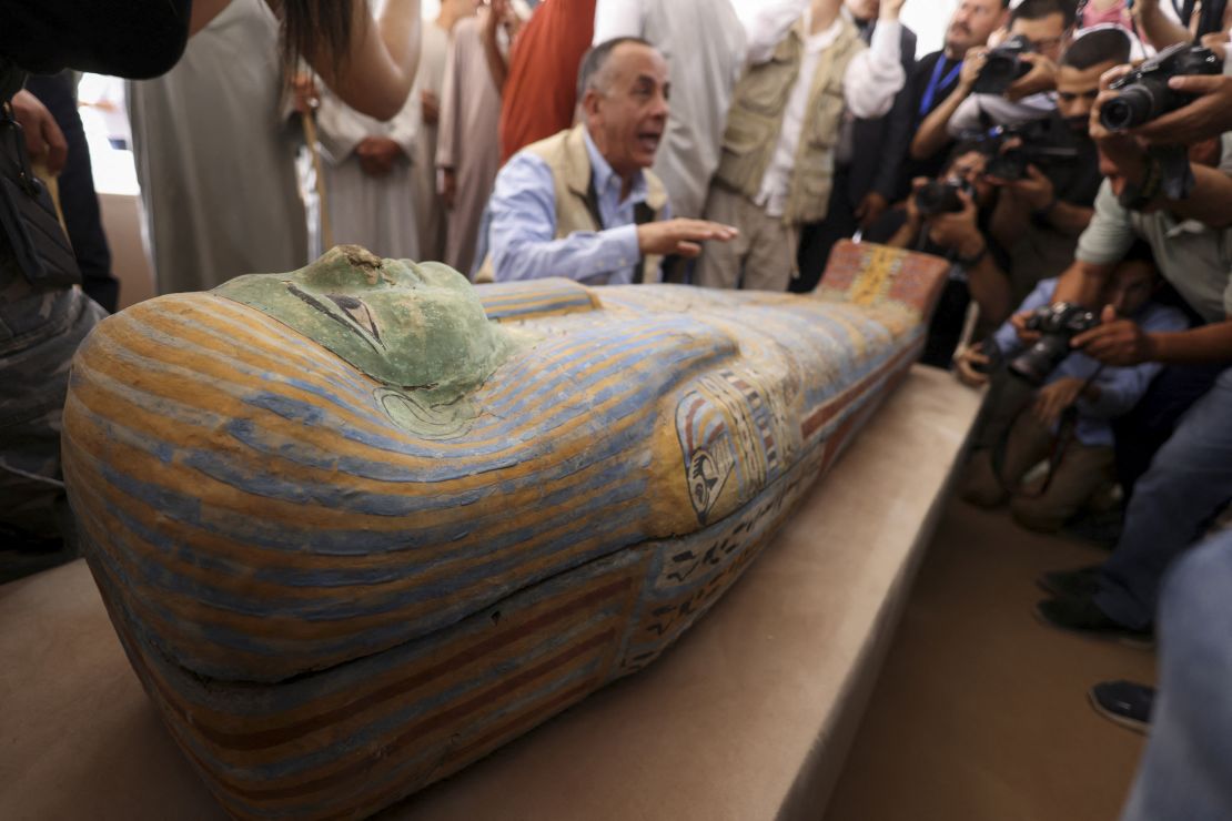 Mostafa Waziri, secretary-general of Egypt's Supreme Council of Antiquities talks to the media next to a sarcophagus found at the newly discovered site where two embalming workshops for humans and animals along with two tombs and a collection of artefacts were also found, near Egypt's Saqqara necropolis, in Giza, Egypt May 27, 2023. REUTERS/Amr Abdallah Dalsh