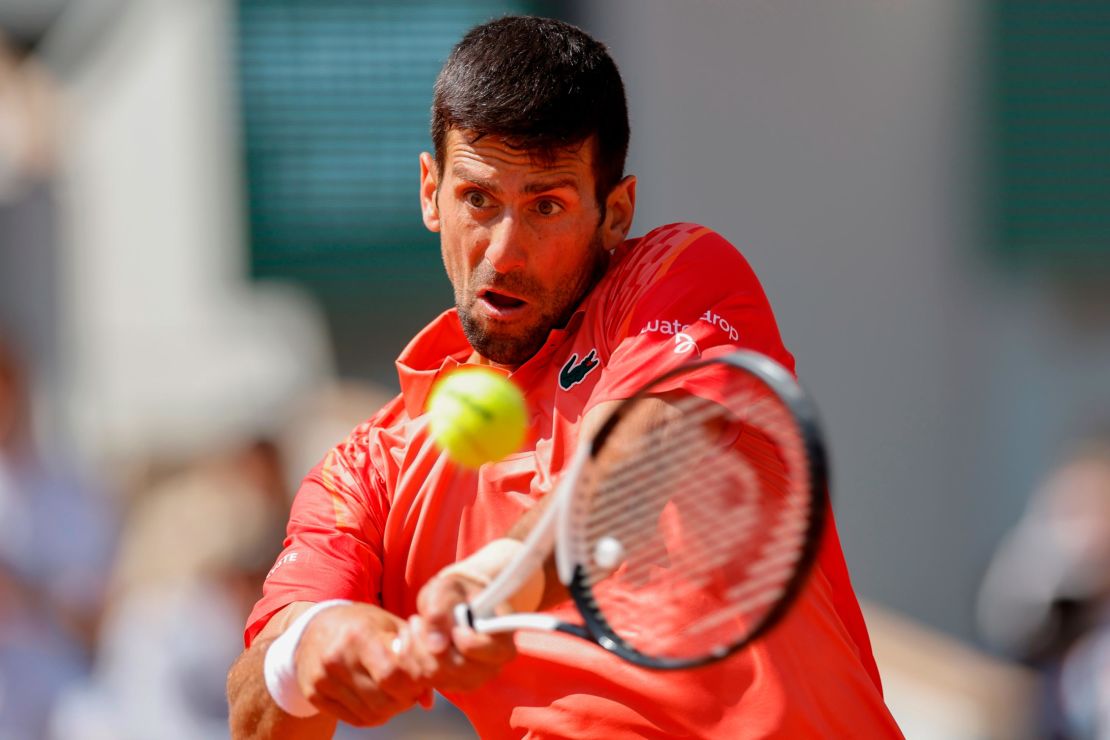 Djokovic plays a shot against Kovacevic.