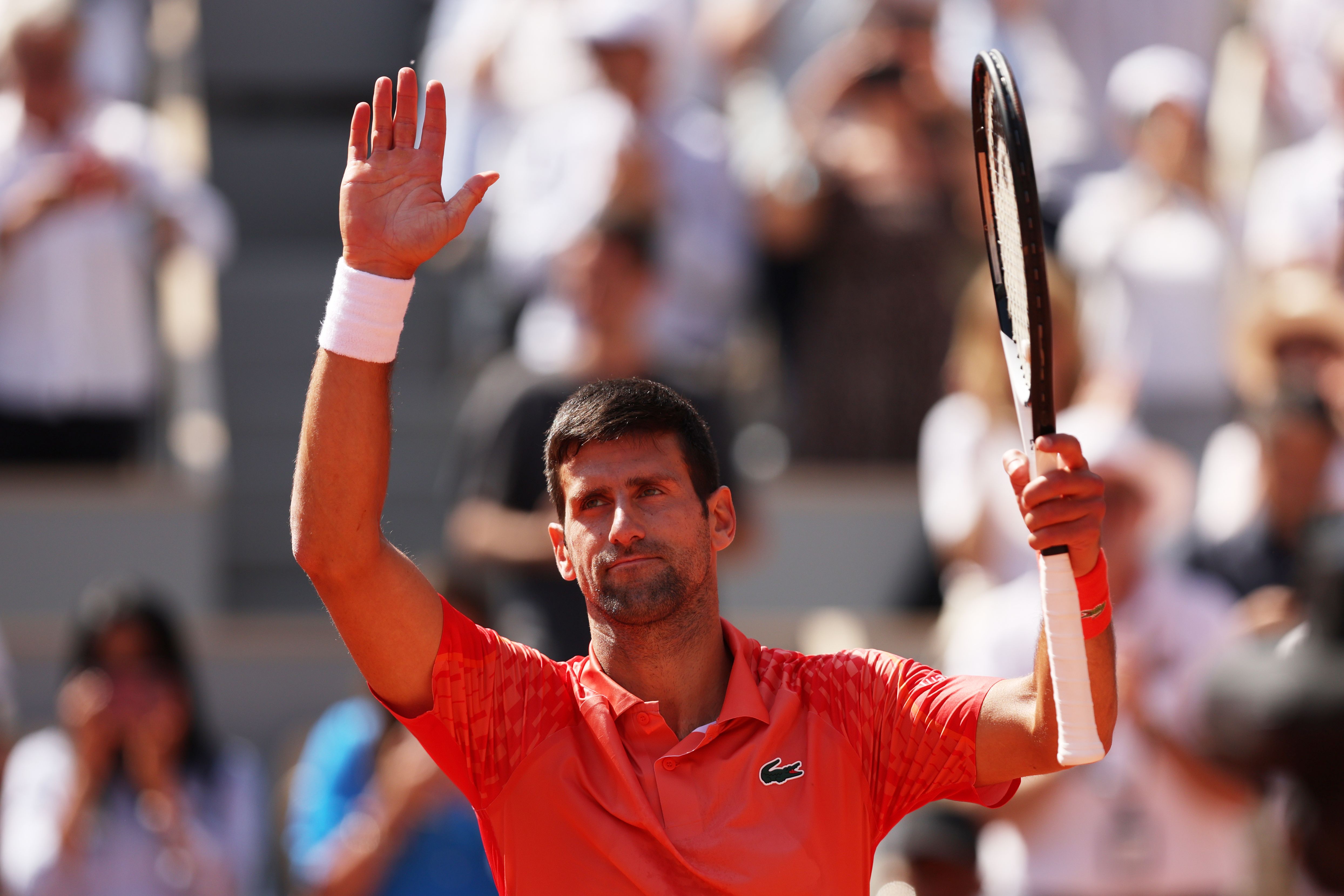 Novak Djokovic gets Open campaign off to winning start; matches Roger Federer record CNN