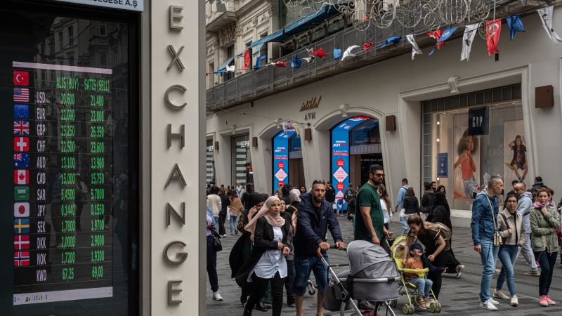 NextImg:Turkish lira hits new record low after Erdogan election victory | CNN Business