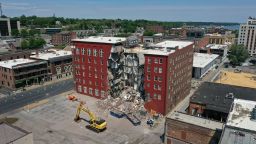 DAVENPORT, IOWA - MAY 29: An aerial view shows a portion of a six-story apartment building after yesterday's collapse on May 29, 2023 in Davenport, Iowa. Eight people were rescued from the debris following the collapse which occurred yesterday afternoon.  (Photo by Scott Olson/Getty Images)