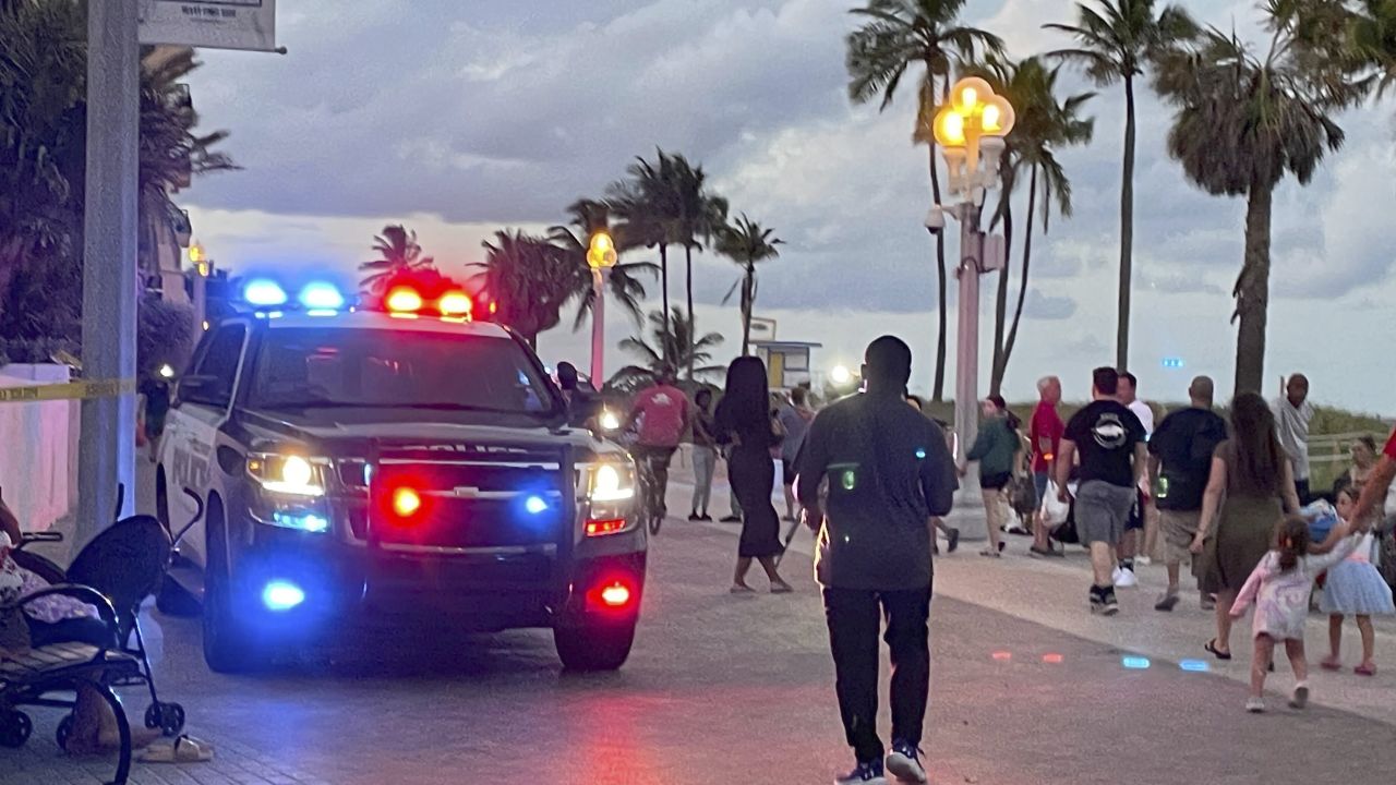 Police respond to a shooting near the Hollywood Beach Broadwalk in Hollywood, Fla., Monday evening, May 29, 2023. (Mike Stocker/South Florida Sun-Sentinel via AP)