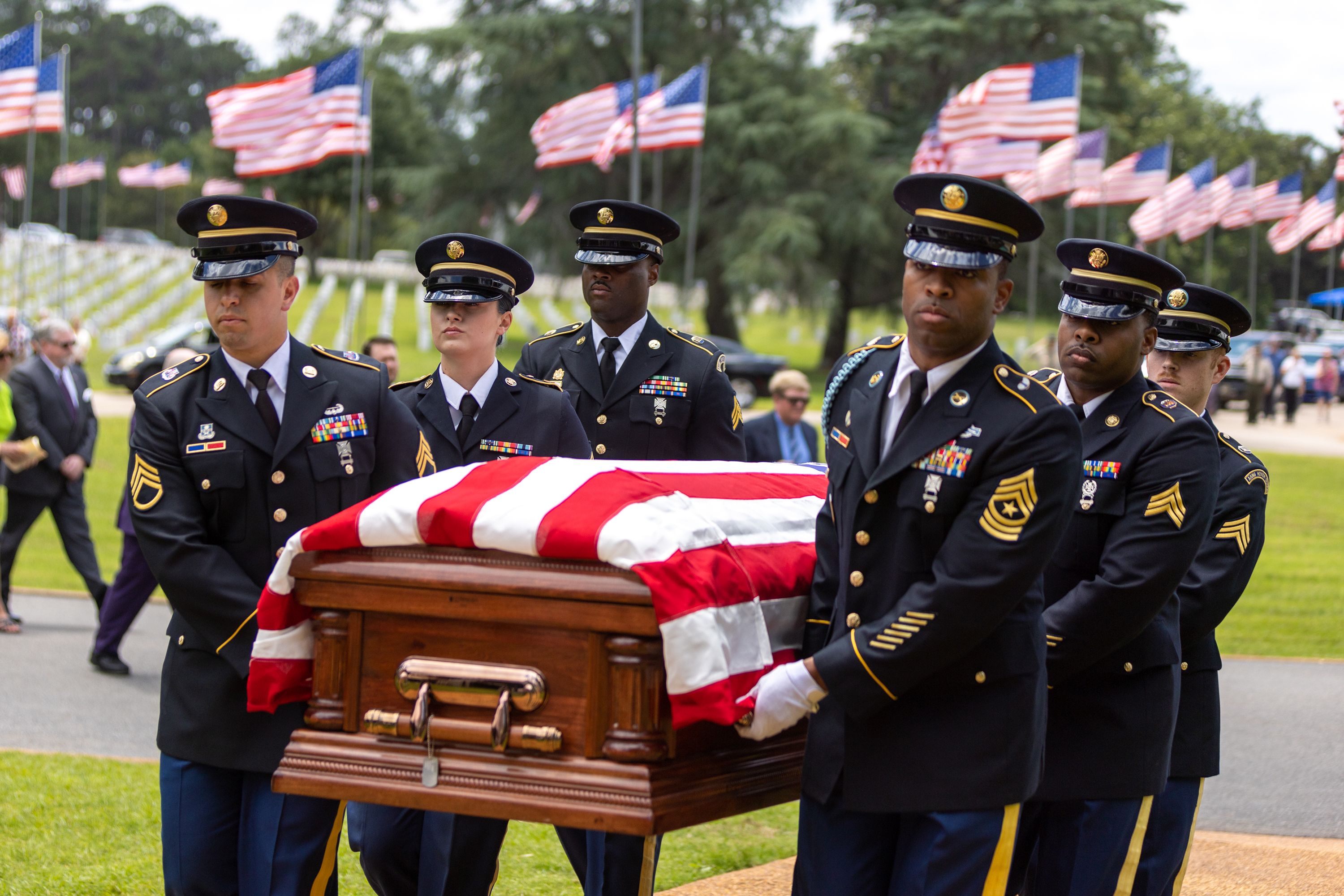 Army National Guard members carry the casket of Medal of Honor recipient Luther Story, who was reinterred with military honors at Andersonville National Cemetery on Monday.