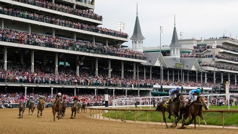 Javier Castellano, right, gallops atop Mage in front of Flavien Prat, atop Angel of Empire, after winning the 149th running of the Kentucky Derby horse race at Churchill Downs Saturday, May 6, 2023, in Louisville, Ky. 