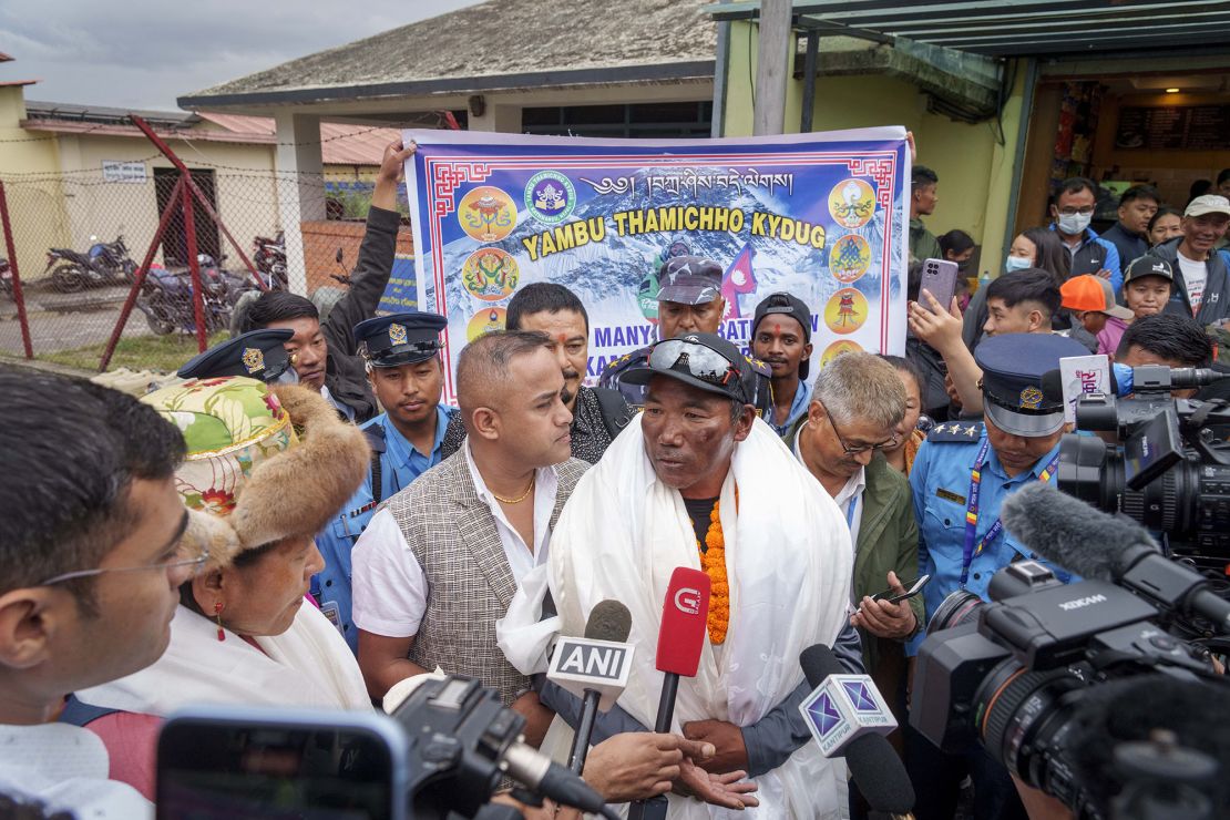 Kami Rita talks to the media at the airport in Kathmandu on May 25, 2023.