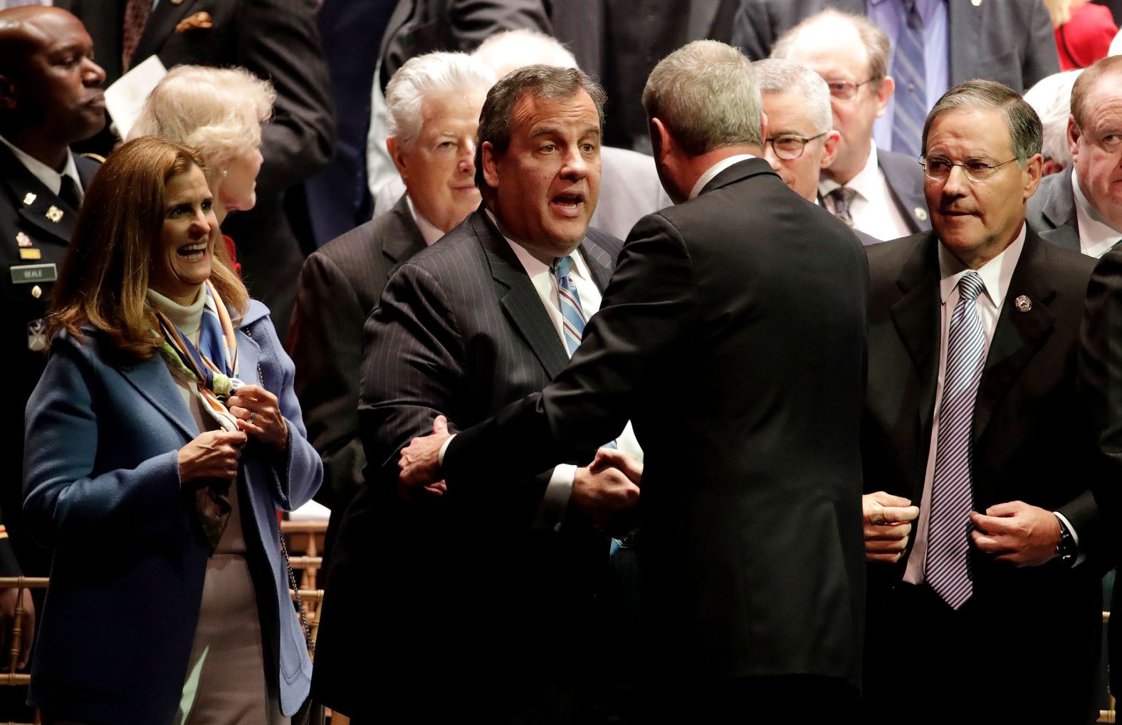 Christie shakes hands with his successor, Phil Murphy, after Murphy was sworn in as governor in January 2018.