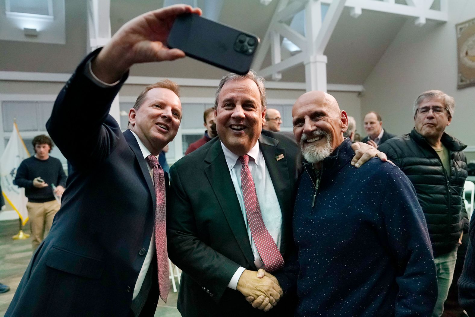 Christie poses for a selfie after a town hall-style meeting in Henniker, New Hampshire, in April 2023.