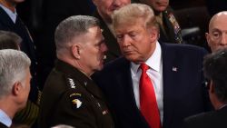 In this February 2020 photo, Chairman of the Joint Chiefs of Staff Gen. Mark Milley chats with President Donald Trump after he delivered the State of the Union address at the Capitol in Washington, DC.