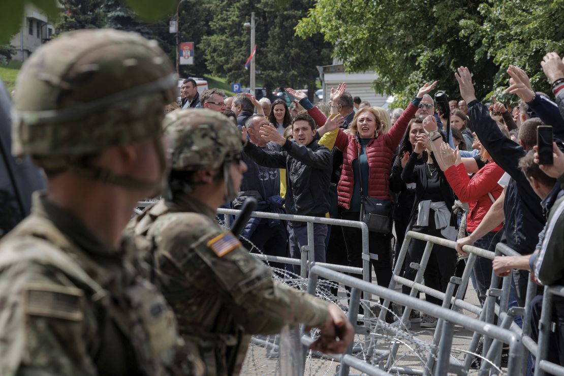 Kosovo Serbs protest as U.S. KFOR soldiers protect the entrance of the municipality office, in the town of Leposavic, Kosovo, May 29.