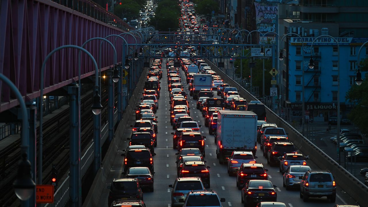 Vehicles sit in traffic while exiting the Williamsburg Bridge on May 10, 2023 in New York City.