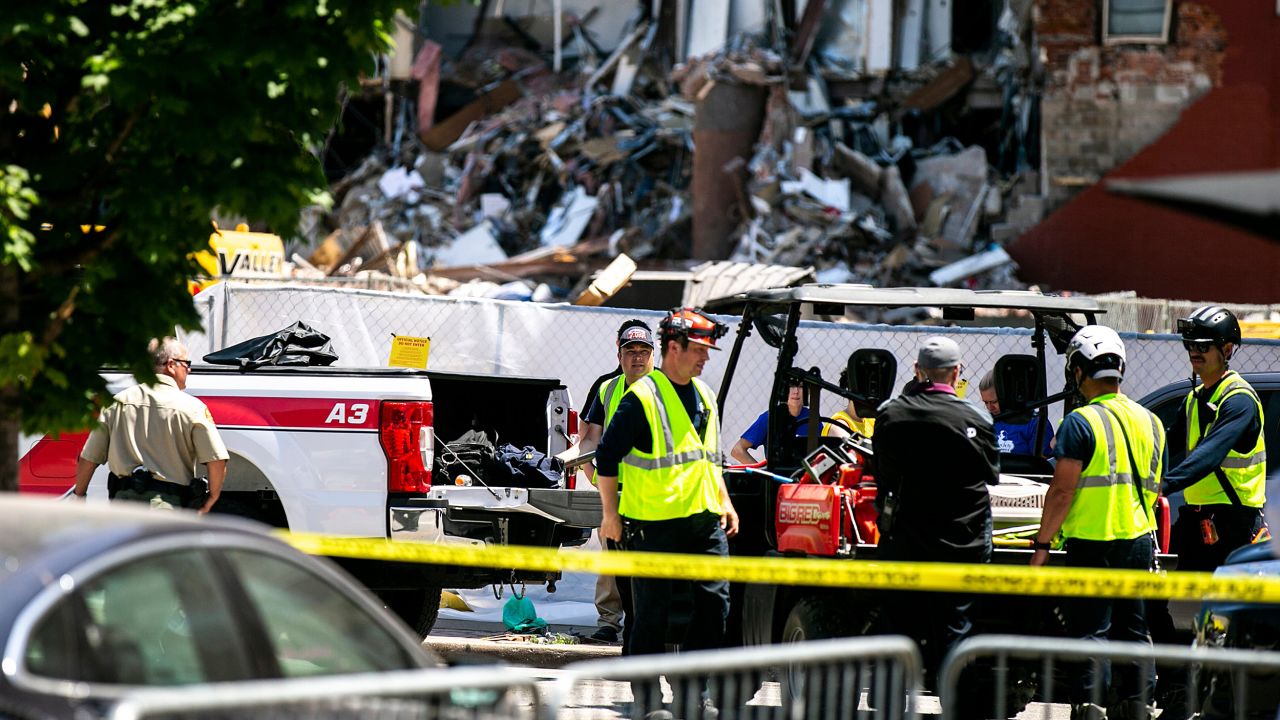 A rescue crew assembles near the collapse site on Tuesday.