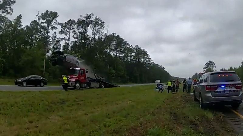 Video: Georgia car crash goes viral after vehicle flies off tow truck ramp