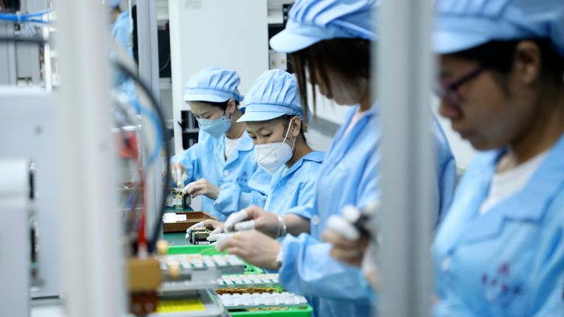 NextImg:China's factory production hits lowest level since the end of zero-Covid policy | CNN Business