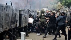 NATO Kosovo Force (KFOR) soldiers clash with local Kosovo Serb protesters at the entrance of the municipality office, in the town of Zvecan, Kosovo, May 29, 2023. REUTERS/Laura Hasani