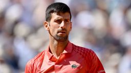 Serbia's Novak Djokovic looks on as he plays against US Aleksandar Kovacevic during their men's singles match on day two of the Roland-Garros Open tennis tournament at the Court Philippe-Chatrier in Paris on May 29, 2023. (Photo by Emmanuel DUNAND / AFP) (Photo by EMMANUEL DUNAND/AFP via Getty Images)