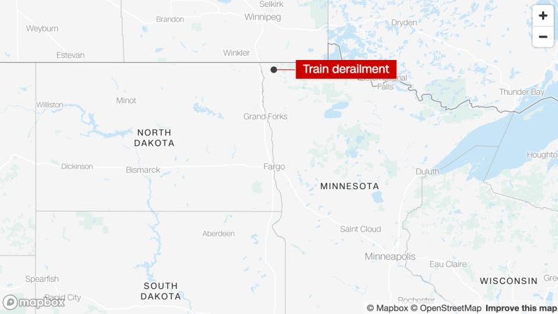 NextImg:Derailment of train carrying hazardous materials in Minnesota closes highway, but there are no signs of leakage, officials say | CNN