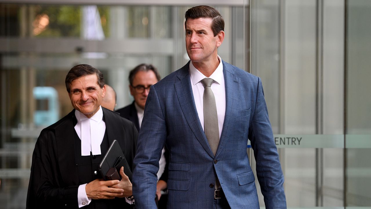 A file image of Ben Roberts-Smith along with barrister Arthur Moses (left) leaving the Federal Court of Australia in Sydney in March, 2022.