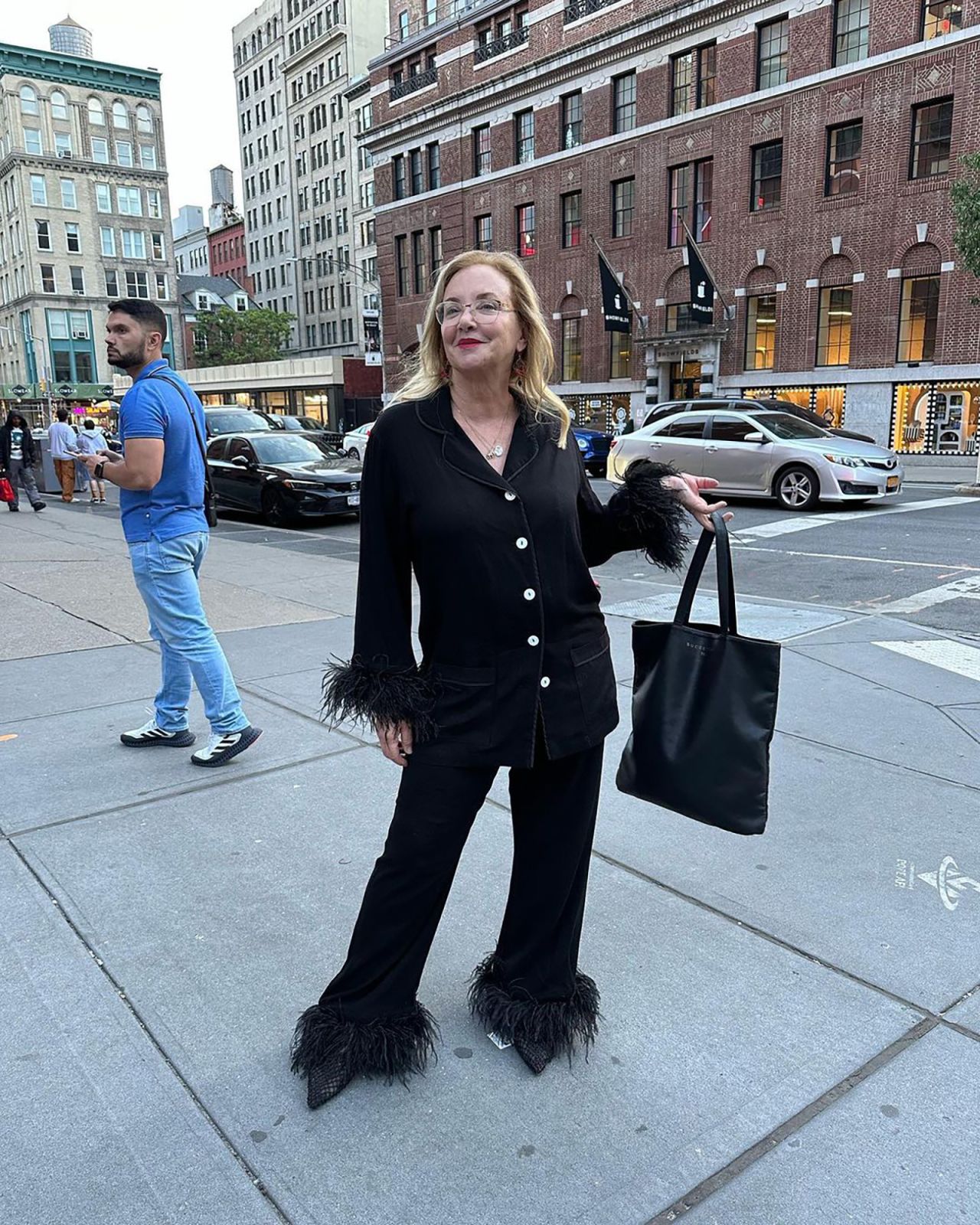 The feather-trimmed set was even praised by Kim Cattrall.