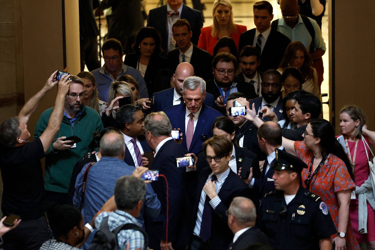 House Speaker Kevin McCarthy speaks to reporters as he walks through Statuary Hall at the US Capitol on Tuesday, May 30.