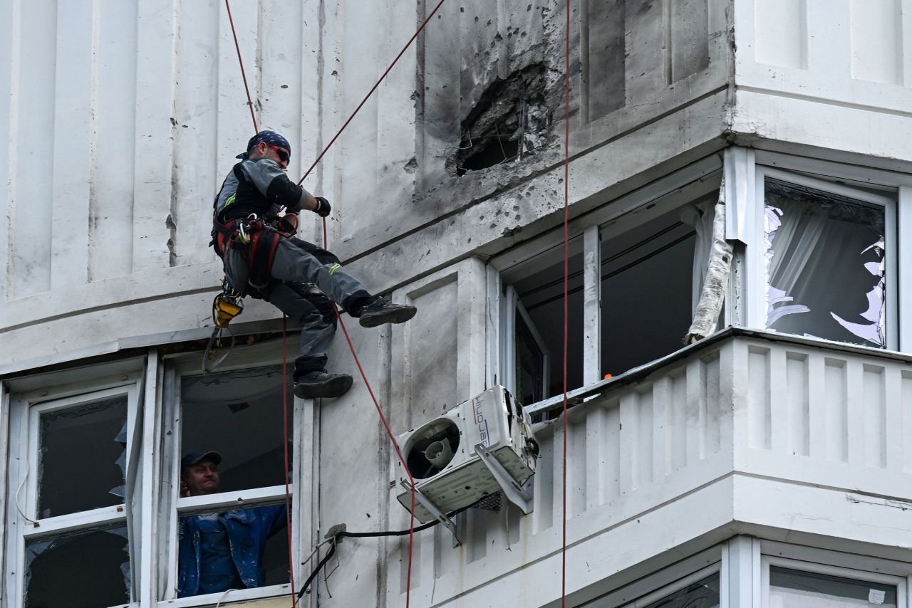 A specialist inspects the damaged facade of a multistory apartment building after a <a href="https://www.cnn.com/2023/05/30/europe/moscow-drone-attack-intl/index.html" target="_blank">reported drone attack</a> in Moscow on Tuesday, May 30. Russia is blaming Ukraine for launching the drone attack, which reportedly left two people injured and several buildings damaged. Ukraine has denied direct involvement.
