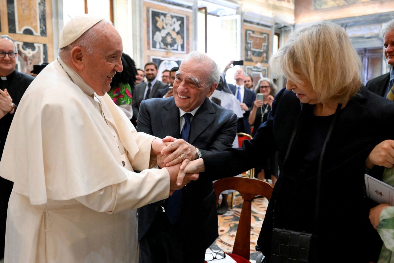 Pope Francis meets with director Martin Scorsese and his wife, Helen Morris, during a conference at the Vatican on Saturday, May 27.