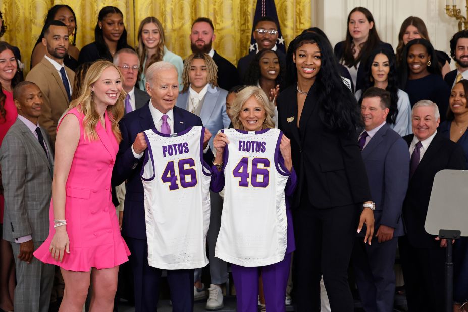 US President Joe Biden and first lady Jill Biden pose for photographs with co-captains Emily Ward, left, and Angel Reese as the LSU women's basketball team visits the White House on Friday, May 26. <a href="http://www.cnn.com/2023/04/02/sport/gallery/iowa-lsu-ncaa-womens-final-photos/index.html" target="_blank">LSU won the national championship in April</a>.