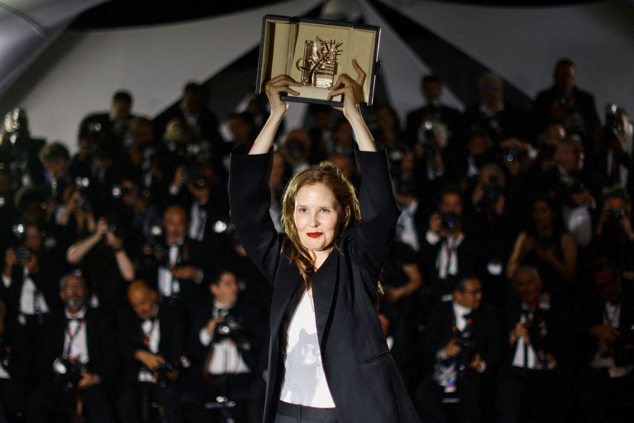 Film director Justine Triet poses with the Palme d'Or that was awarded to her film "The Anatomy of a Chute" at the Cannes Film Festival in France on Saturday, May 27.