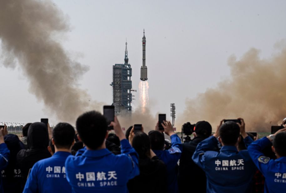 A rocket takes off from Jiuquan, China, on Tuesday, May 30, carrying three astronauts into space. The three-man crew was heading to China's Tiangong space station.