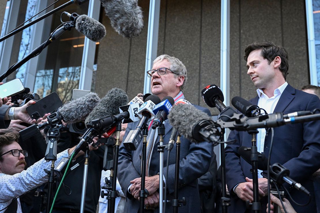 Journalists Chris Masters (L) and Nick McKenzie (R) talk to the media outside the Federal Court of Australia in Sydney on June 1, 2023. Ben Roberts-Smith, one of Australia's most decorated soldiers, lost a landmark defamation case against major newspapers on June 1 after a bruising trial that saw accusations of murder, domestic violence, witness intimidation and war crimes. 