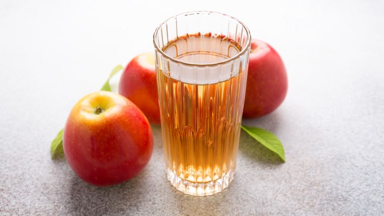 glasses of apple juice and red apples, autumn harvest