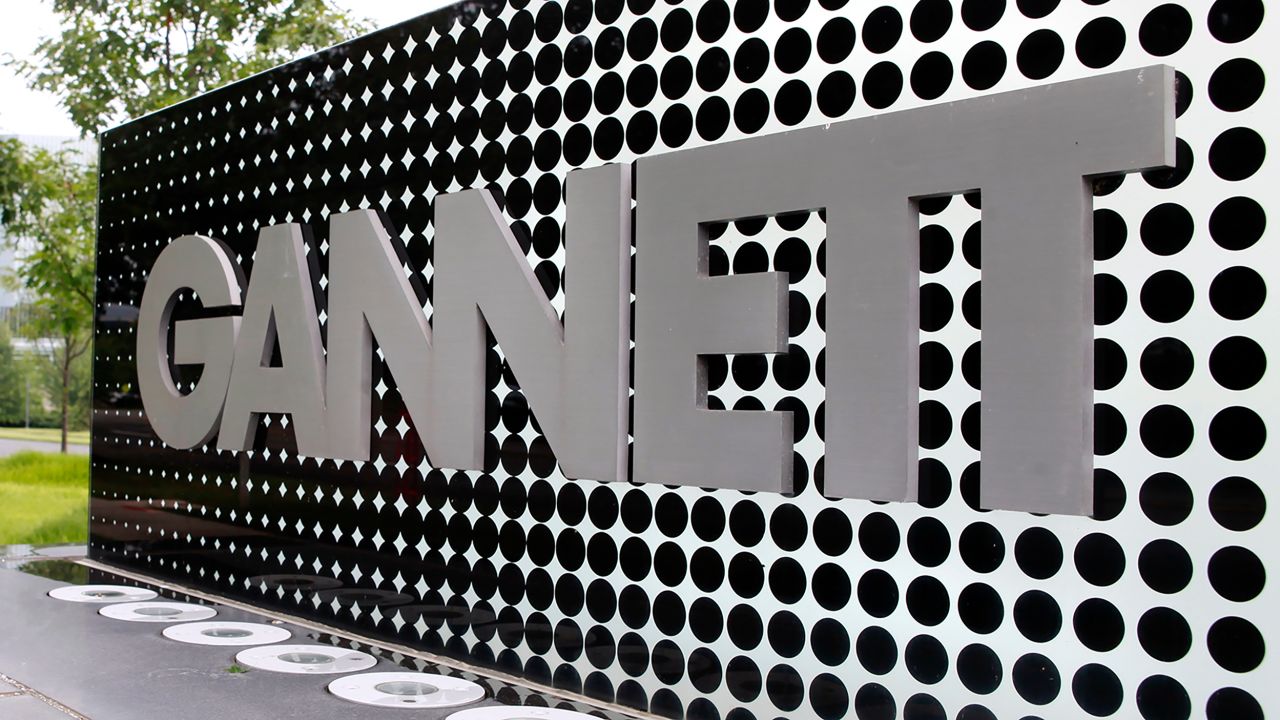 In this July 14, 2010, file photo, the Gannett Co.headquarters sign stands in McLean, Va.